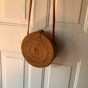 Circular purse, 24" strap, 8" across, 3" thick